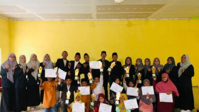 Foto : Mahasiswa KKM-DR UIN Malang dengan Para Juara Musabaqoh Gebyar TPQ